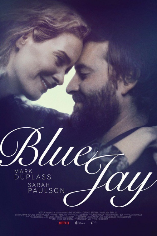 The film poster showing Amanda (Sarah Paulson) and Jim (Mark Duplass) holding each other close.